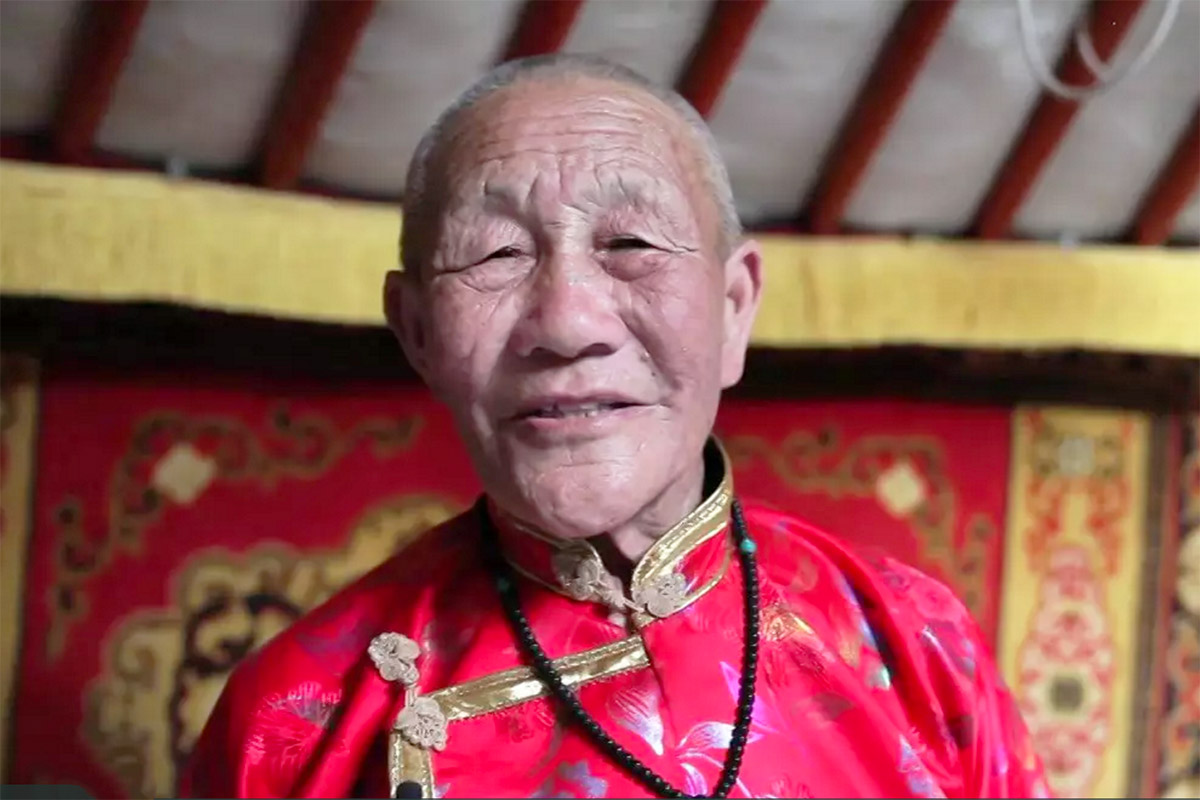 an old man in traditional garb