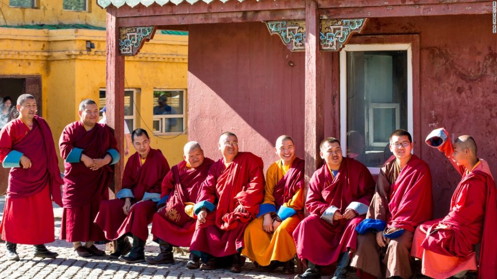 monks sitting outside